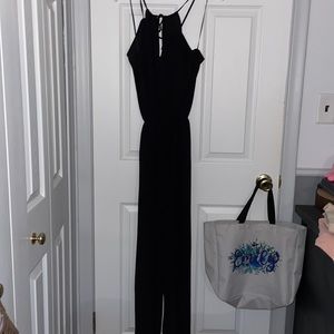 Strapy black candies jumpsuit.